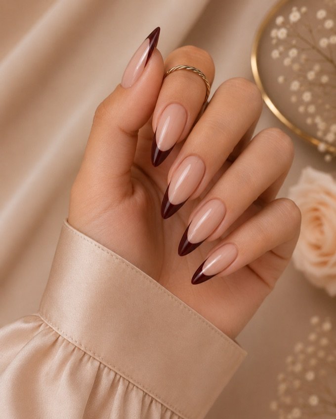 Burgundy French tip almond nails